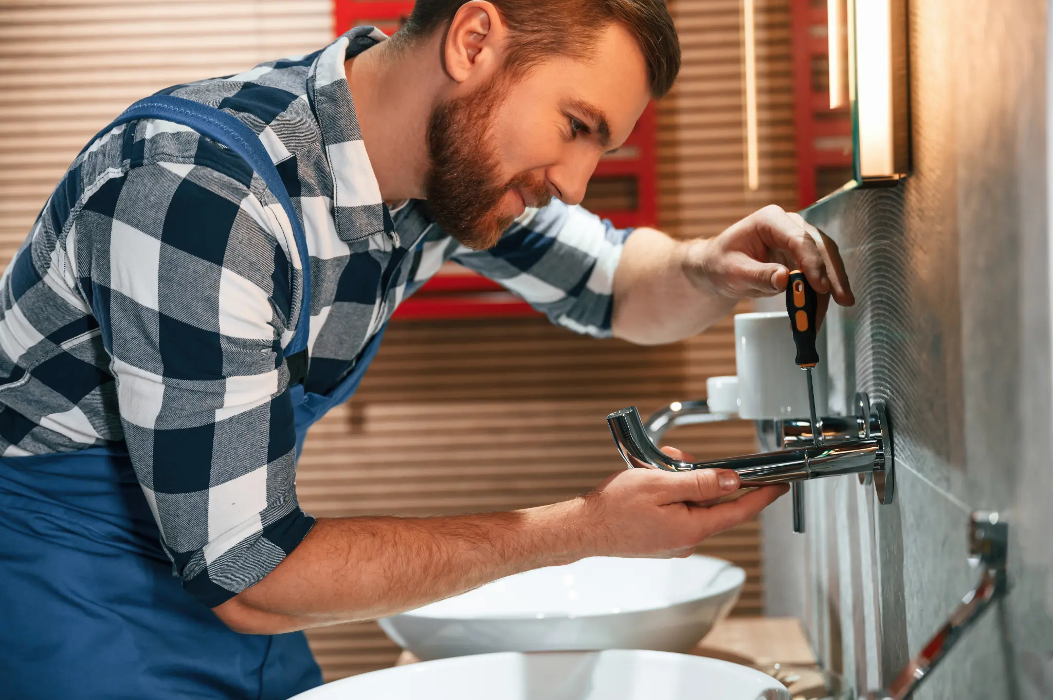 Skilled plumber performing repairs